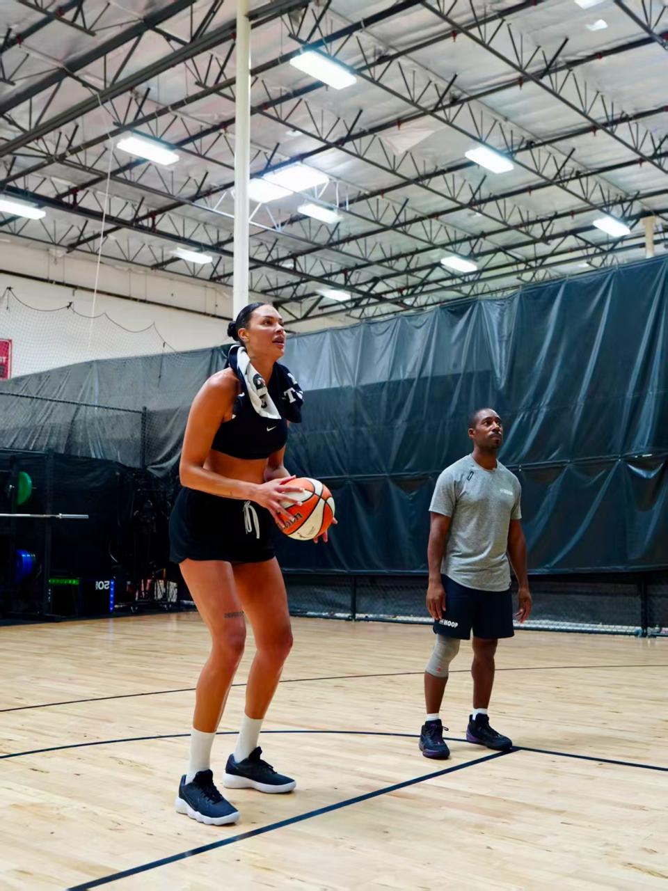 Coach Russell working with a player